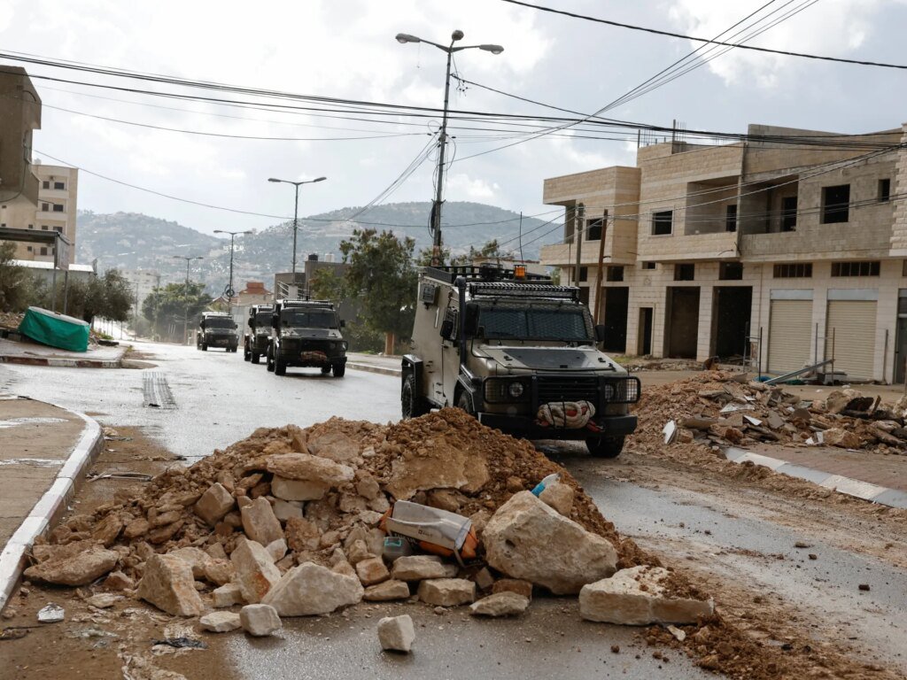 Israeli troops seize residences and enforce curfew in Qabatiya, West Bank.