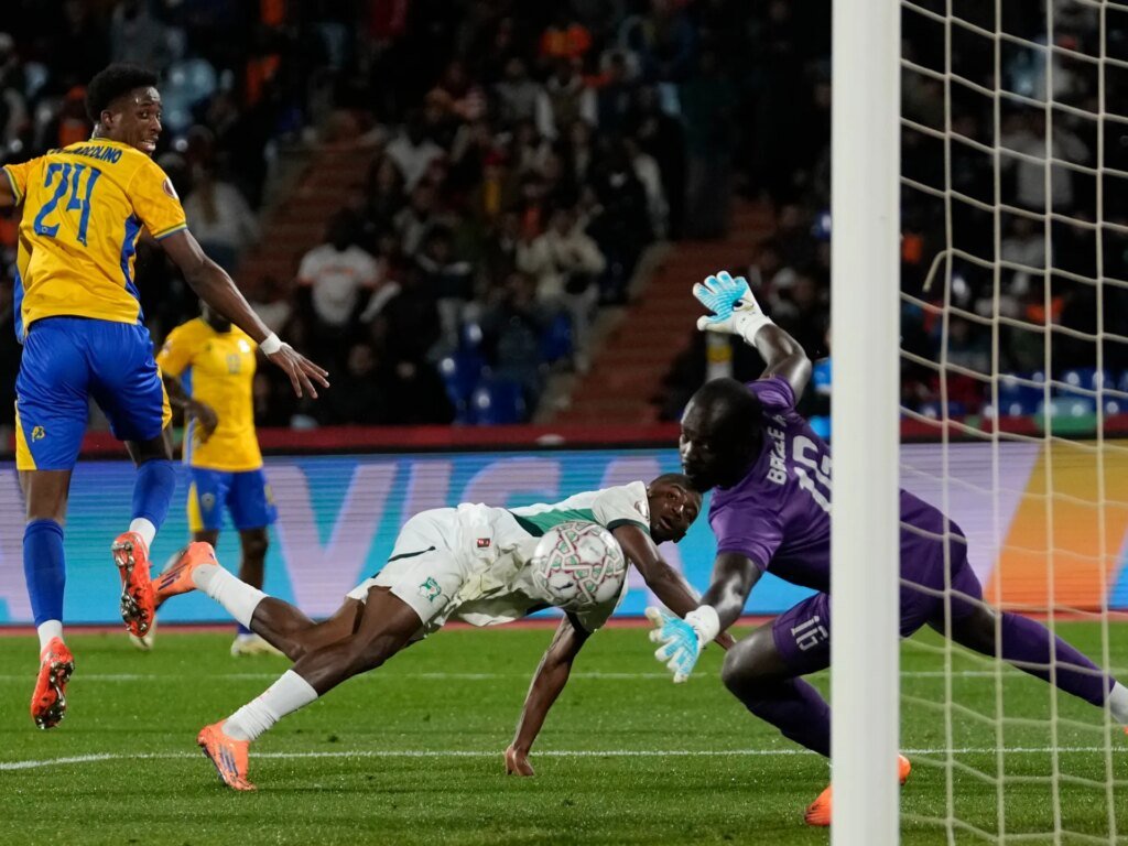 Ivory Coast rallies to defeat Gabon and claims top spot in AFCON group over Cameroon.