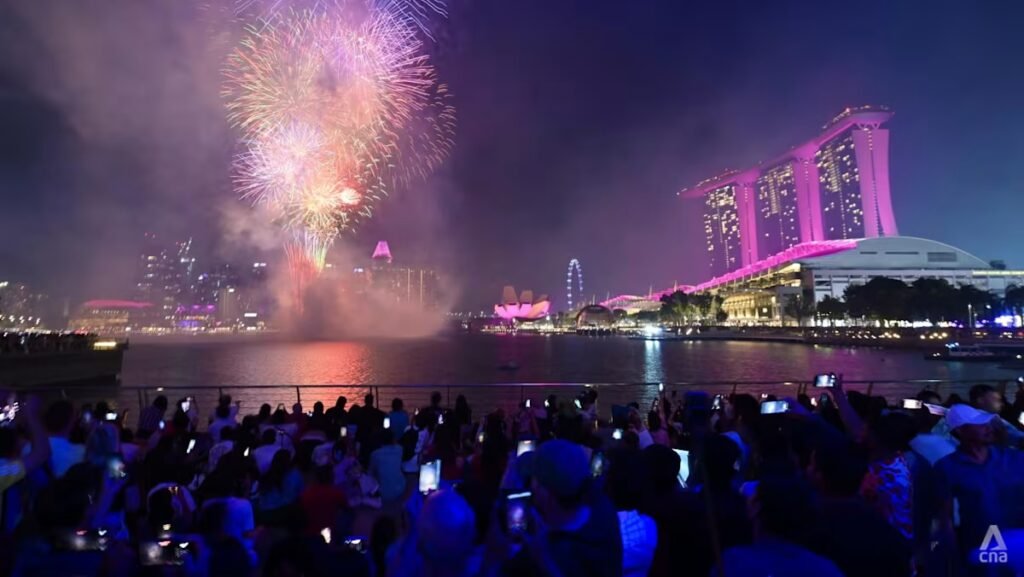 Massive crowds converge at Marina Bay to celebrate Singapore's arrival into 2026.