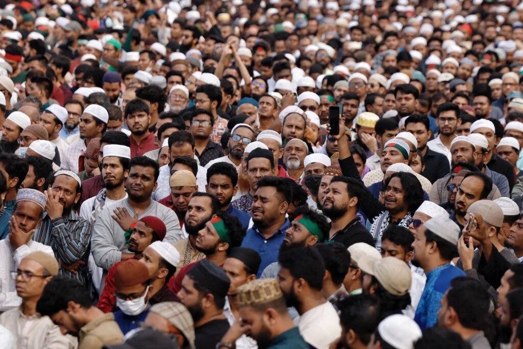 Thousands take to the streets for the funeral of Bangladeshi activist.