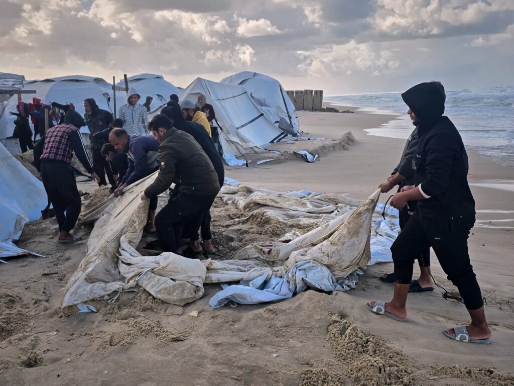 Winter floods devastate displacement camps in Gaza as Israel halts assistance.