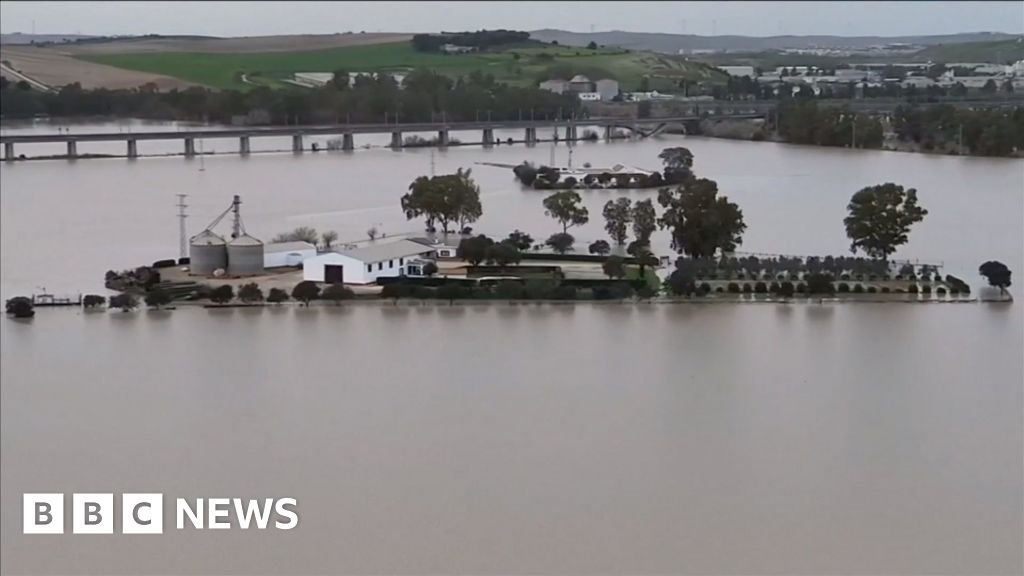 Drone footage captures inundated cities as storms strike Spain.