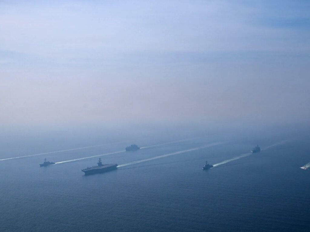 White House advises Iran to consider deal carefully amidst military escalation.