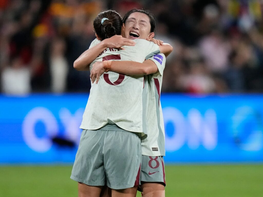 China's coach urges players to remain 'composed' during Taiwan matchup at the Asian Cup.