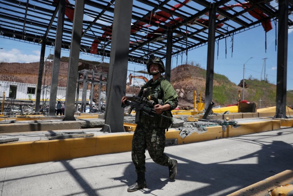Car explosion strikes Colombian highway just a day after new president takes office.
