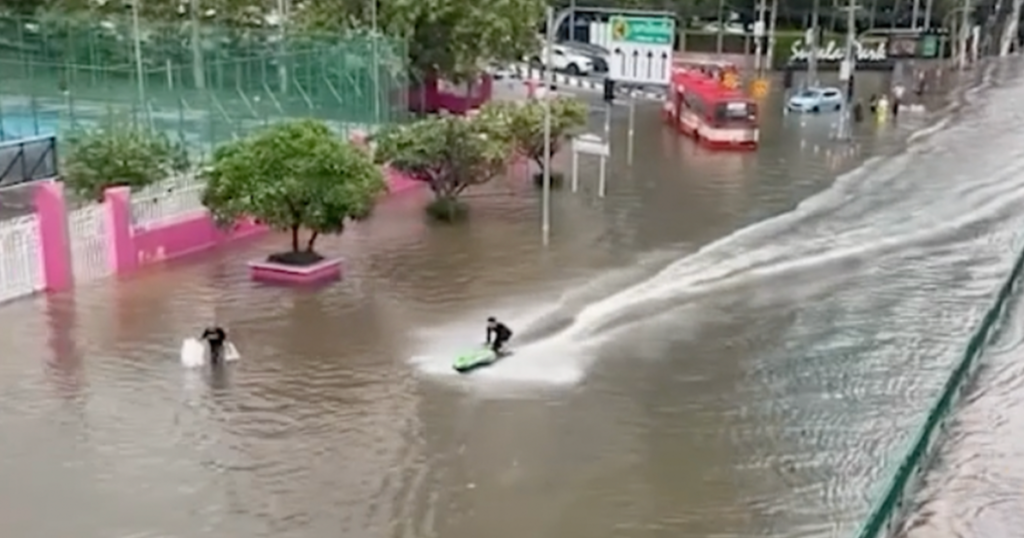 Thai authorities apprehend jet skier following thrill ride through inundated Bangkok roads.